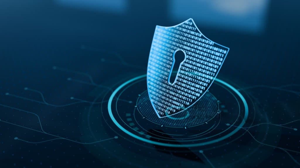 A glowing shield with a keyhole made of binary code above a ring of circuit lines, illustrating data protection.
